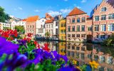 Häuser an einem Kanal in der Altstadt von Gent, Belgien